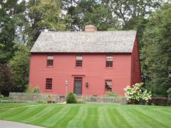 image of red house when looking to hire a realtor in Lowell