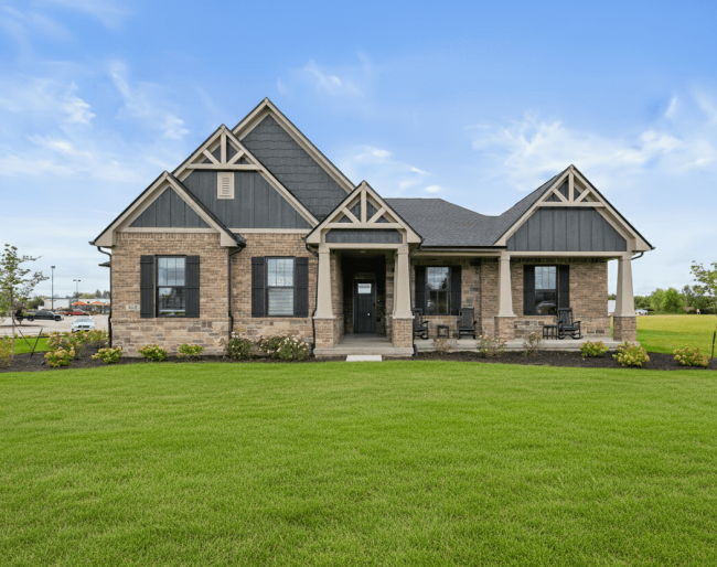 Single-story brick house with dark trim, gabled roof, and large front lawn under a blue sky—ideal for buyers searching Valpo homes for sale.